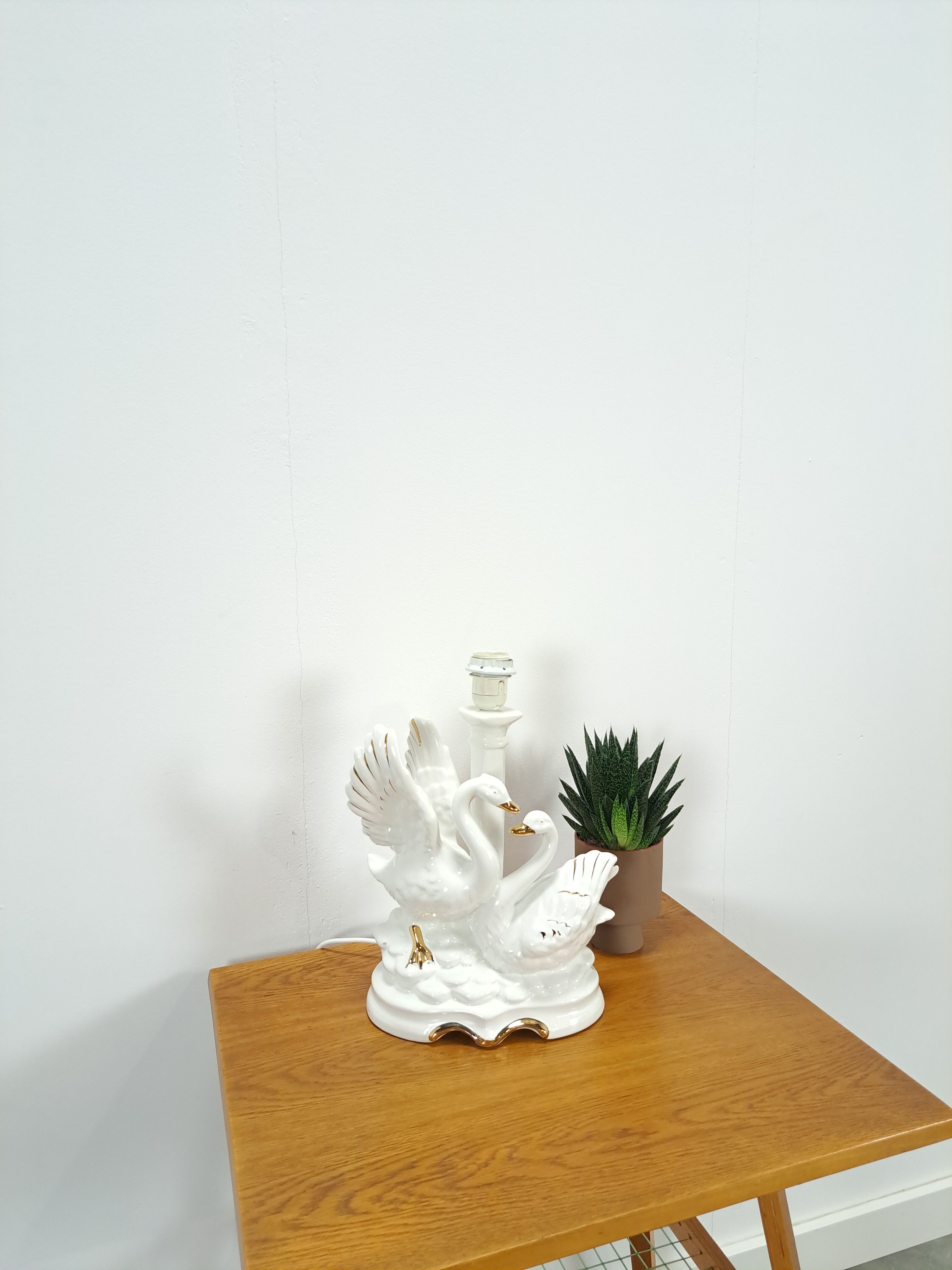 Porcelain lamp swans with vintage gold details