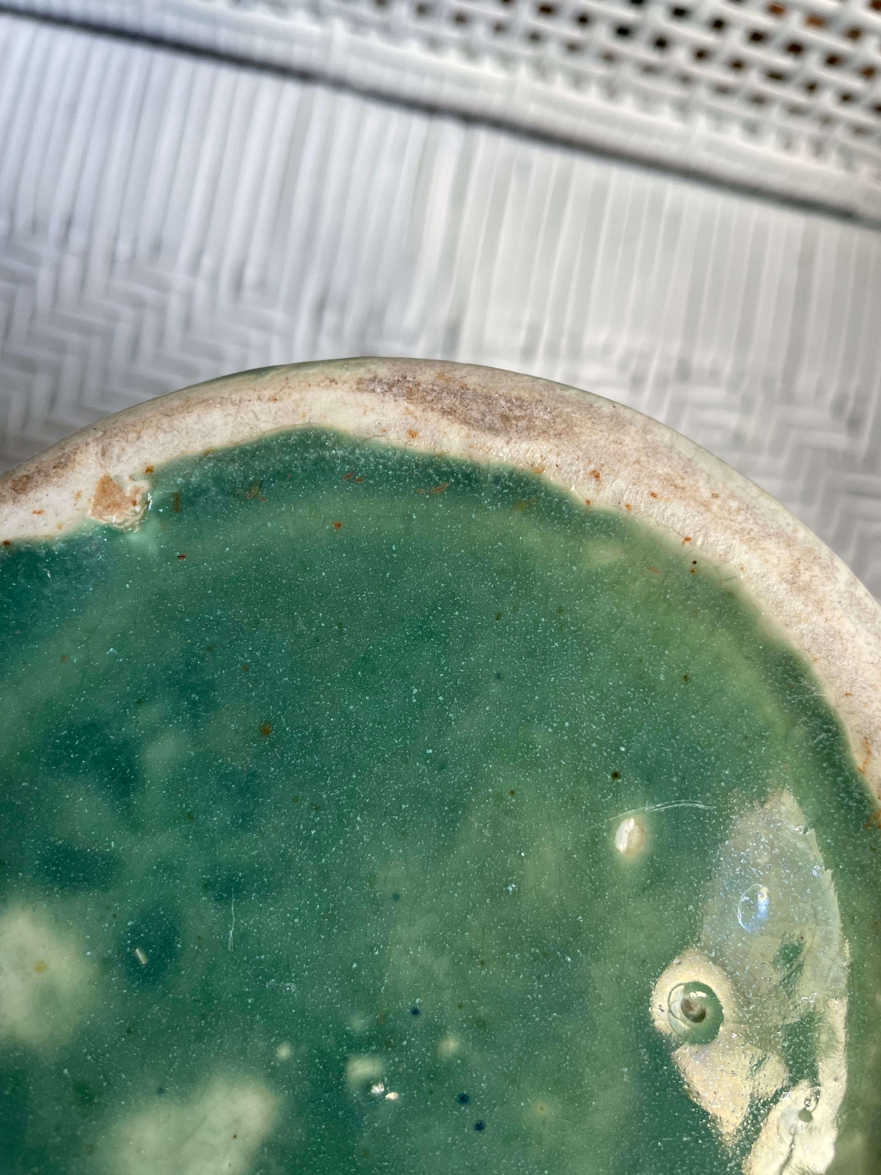 Turquoise green enamelled ceramic pitcher