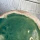 Turquoise green enamelled ceramic pitcher
