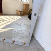Pair of "Memphis" mirrors from the 80s in chrome and wood.