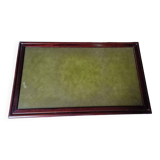 Living room coffee table with green leather and wood top