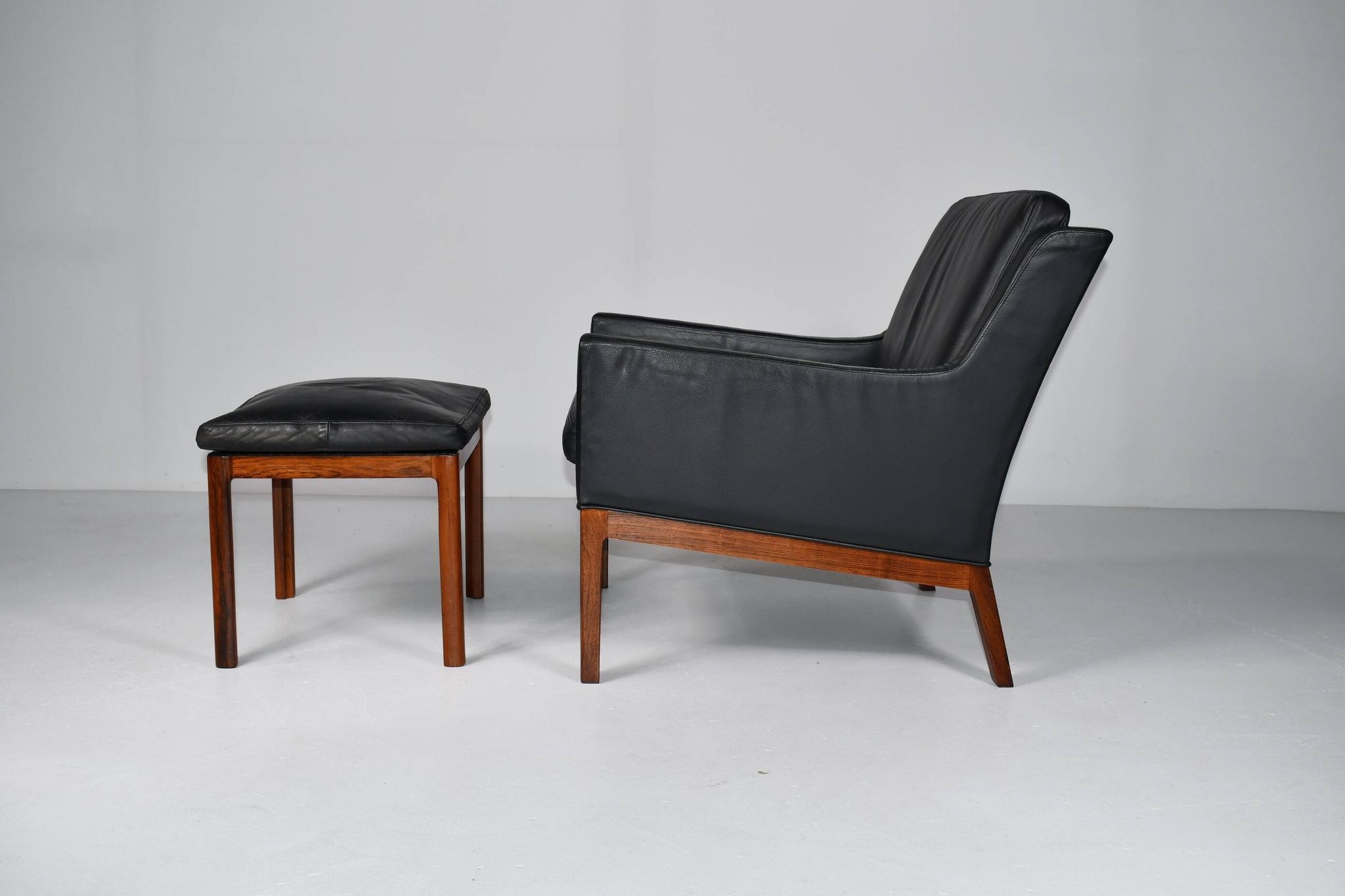 Leather armchair and footstool by Kai Lyngfeldt-Larsen. Denmark 1960s