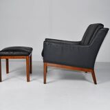 Leather armchair and footstool by Kai Lyngfeldt-Larsen. Denmark 1960s