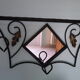 Wrought iron wall holder with top support and built-in mirror