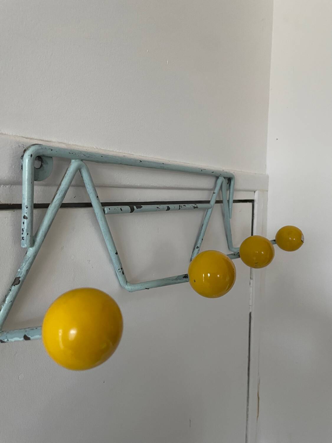 Vintage iron and wood wall coat rack