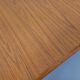 Rectangular dining table in vintage Scandinavian style made of teak and melamine.