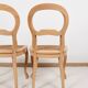 Paire de chaises cannées, en bois