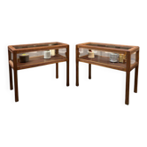 Pairs of Art Deco style mahogany display cabinets from the 1960s with sliding doors.