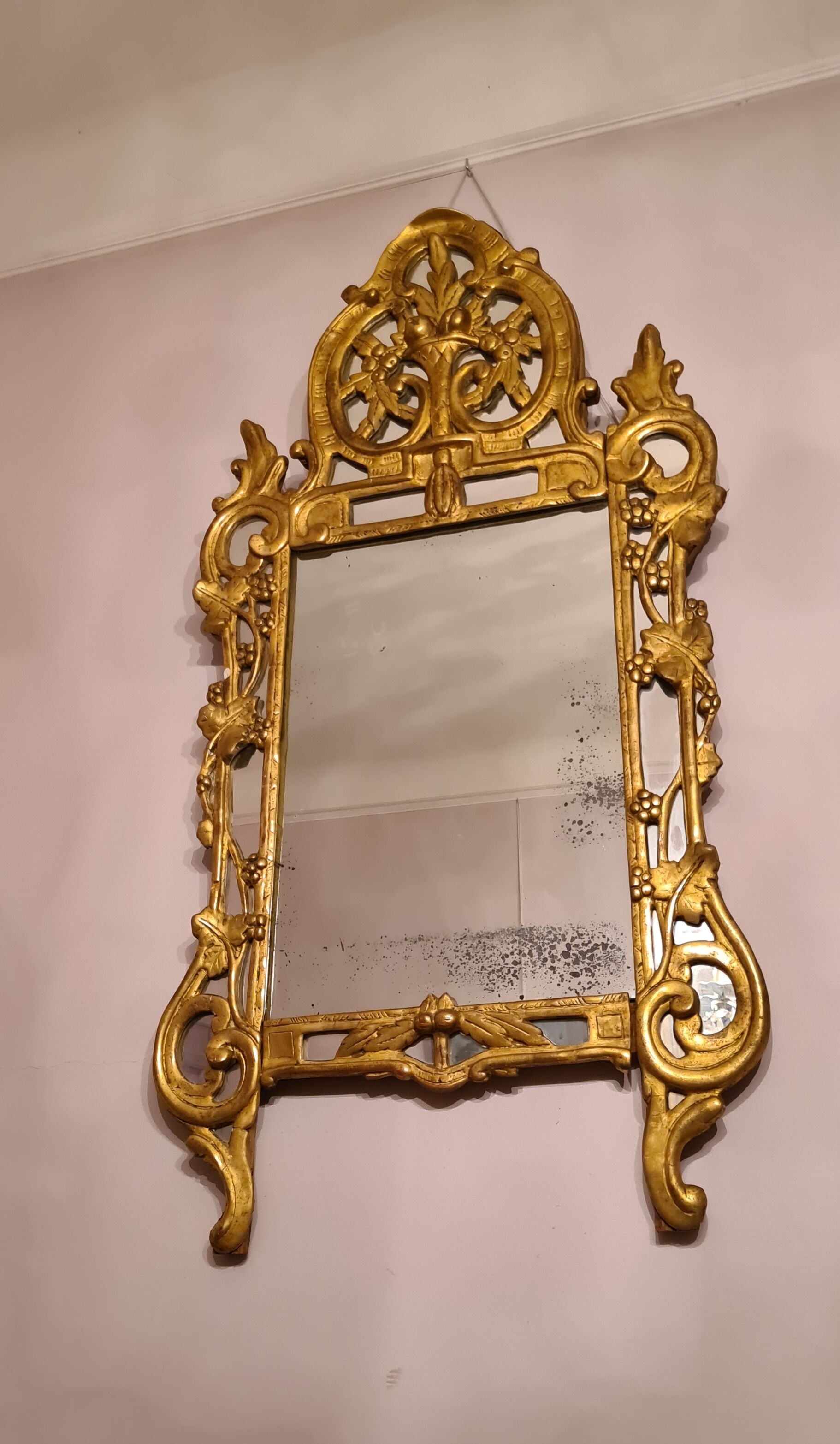 Gilded wooden mirror with parecloses, Louis XV period, circa 1750, 58x120cm