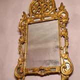 Gilded wooden mirror with parecloses, Louis XV period, circa 1750, 58x120cm