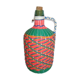 Vintage and multi-coloured demijohn