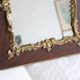 Old wooden and stucco mirror