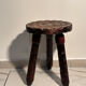 Brutalist sculpted tripod stool in solid wood — 1960s
