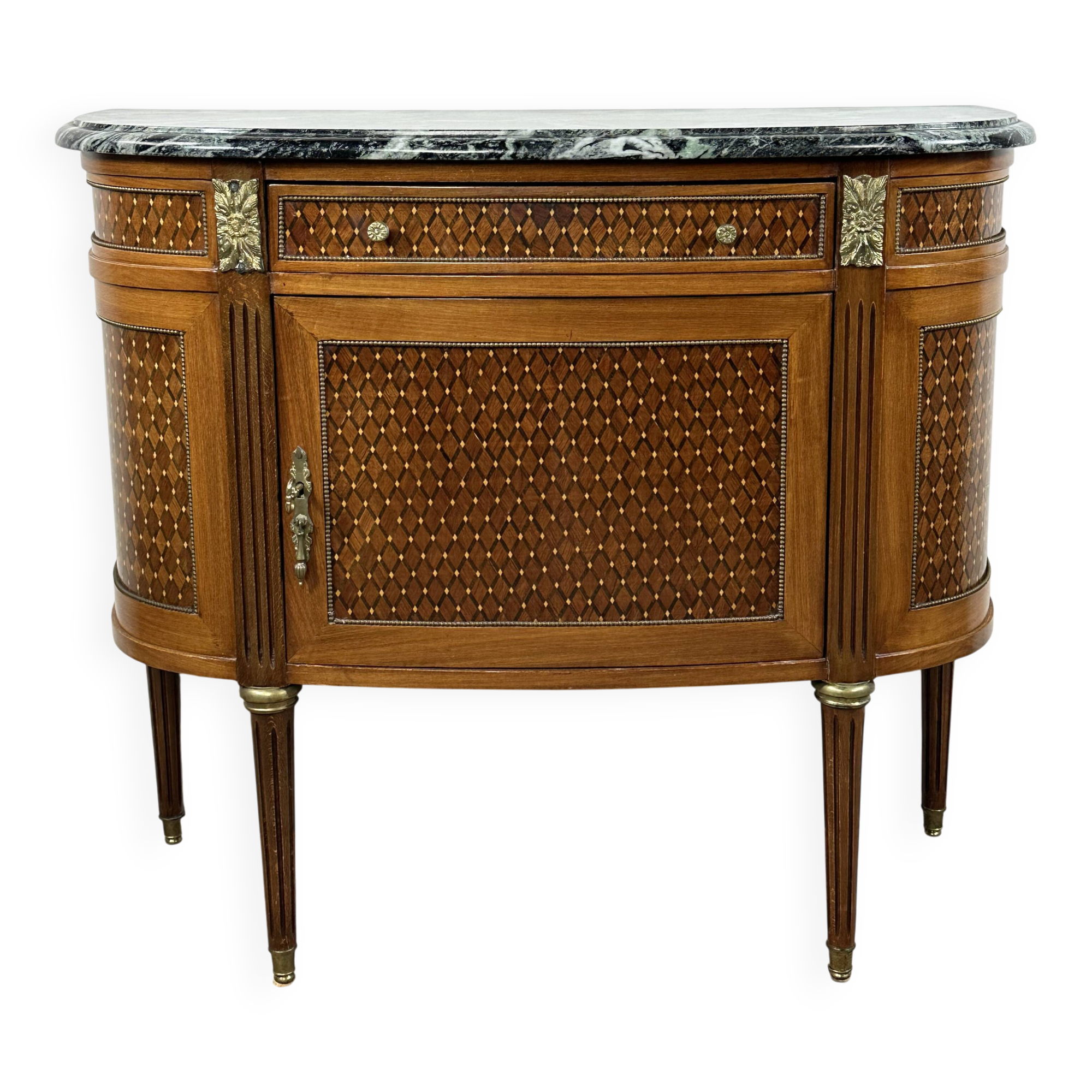 Half-moon commode in the Louis XVI style