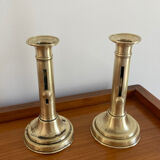 Pair of antique brass push candlesticks