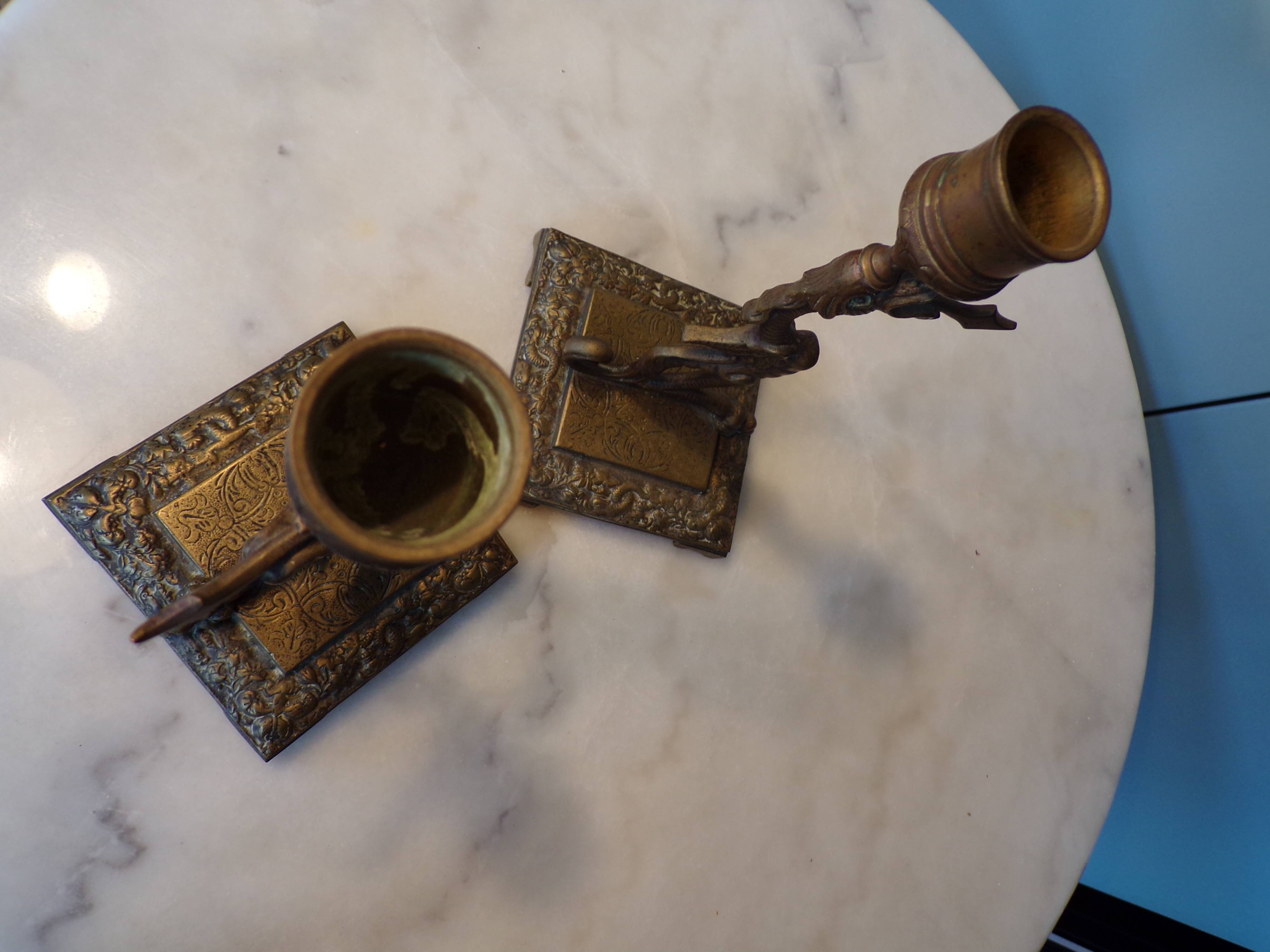 Pair of bronze chimera candlesticks