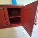 Low red "Guérande" buffet, zinc top, butcher's fridge-style doors