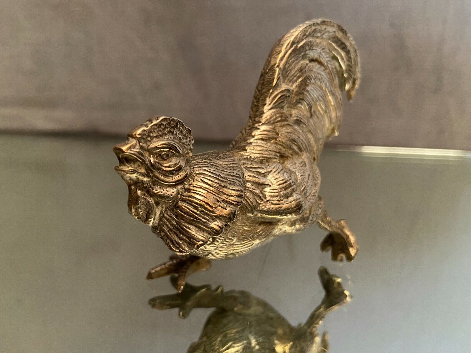 Subject to the silver metal rooster