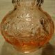 Pink molded pressed glass vase decorated with hazel foliage