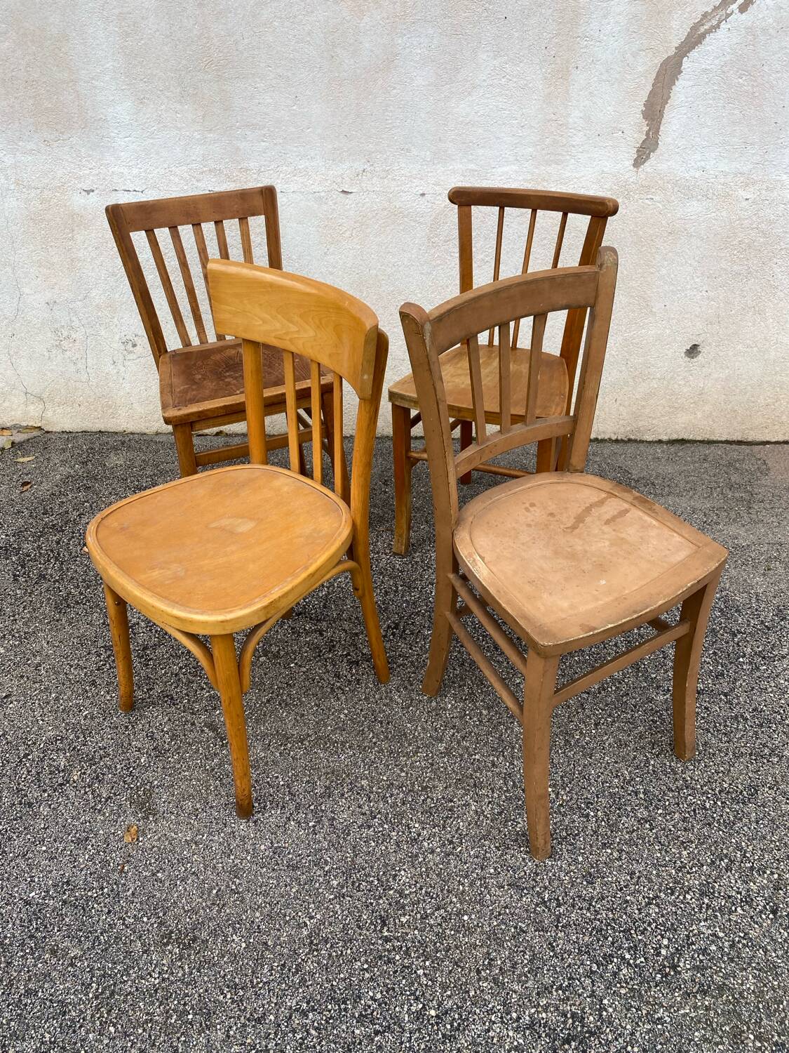 Set of 4 yellow mismatched bistro chairs