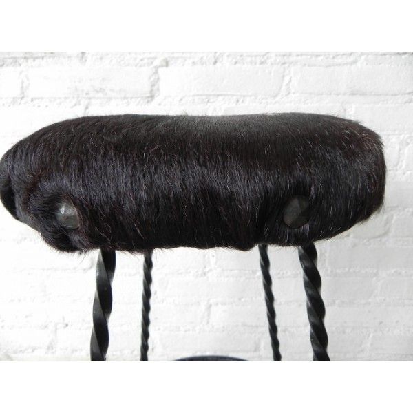 Tabouret vintage bordée de peau de vache