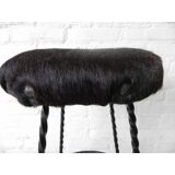 Vintage stool lined with cowhide