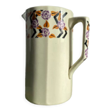 Porcelain pitcher with floral motifs