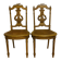 Paire de chaises de musiciens en bois sculpté et doré de style Louis XVI