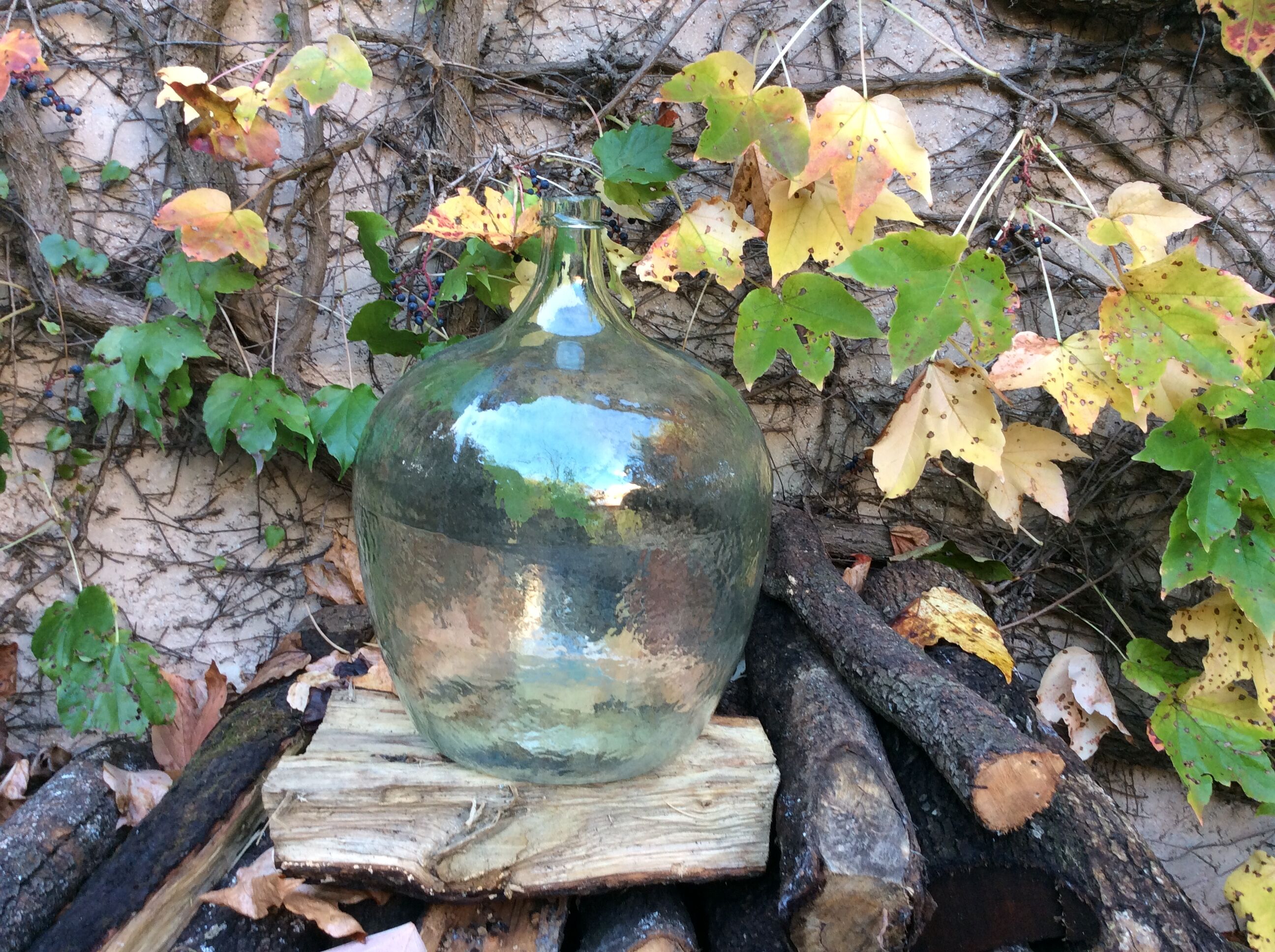 An old "Dame-jeanne" in blown glass, beginning of the nineteenth century
