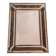 Beveled mirror decorated with flowers