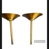 Two Lucien Gau floor lamps in bronze