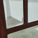 Antique beveled mirror on a wooden frame, 1930