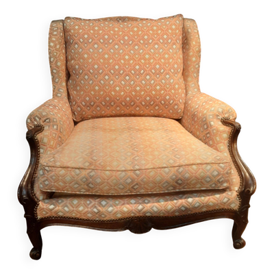 Très large fauteuil  à oreille de style Louis XV