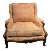 Very large wingback armchair in Louis XV style.