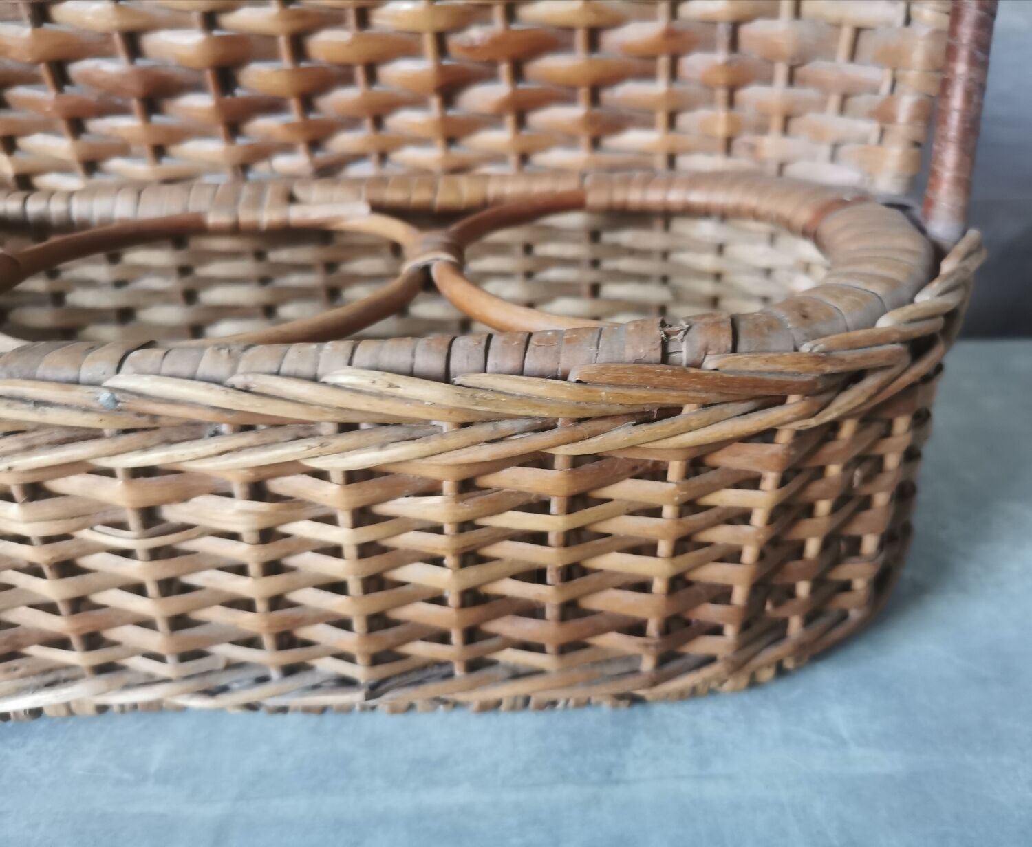 Vintage wicker bottle rack
