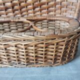 Vintage wicker bottle rack