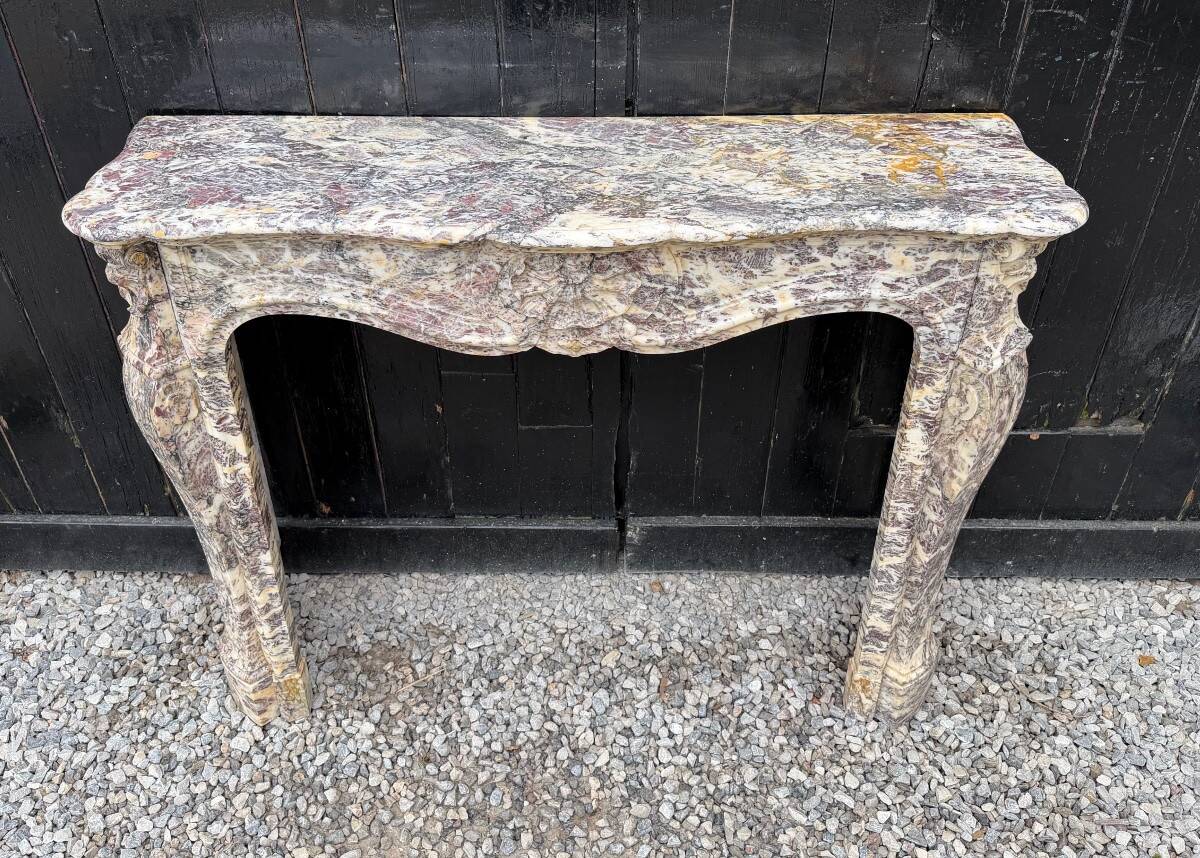 Louis XV style fireplace in Brocatelle marble, circa 1880.