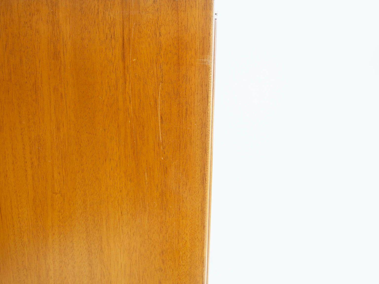 Large Swedish mahogany storage unit with four front doors.