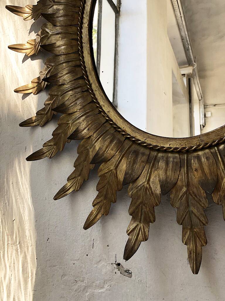 Old flowered sun golden mirror