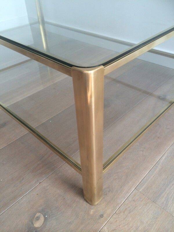 Large coffee table with a double top in polished bronze and glass, signed Jacques Théophile Lepelletier and stamped Broncz.