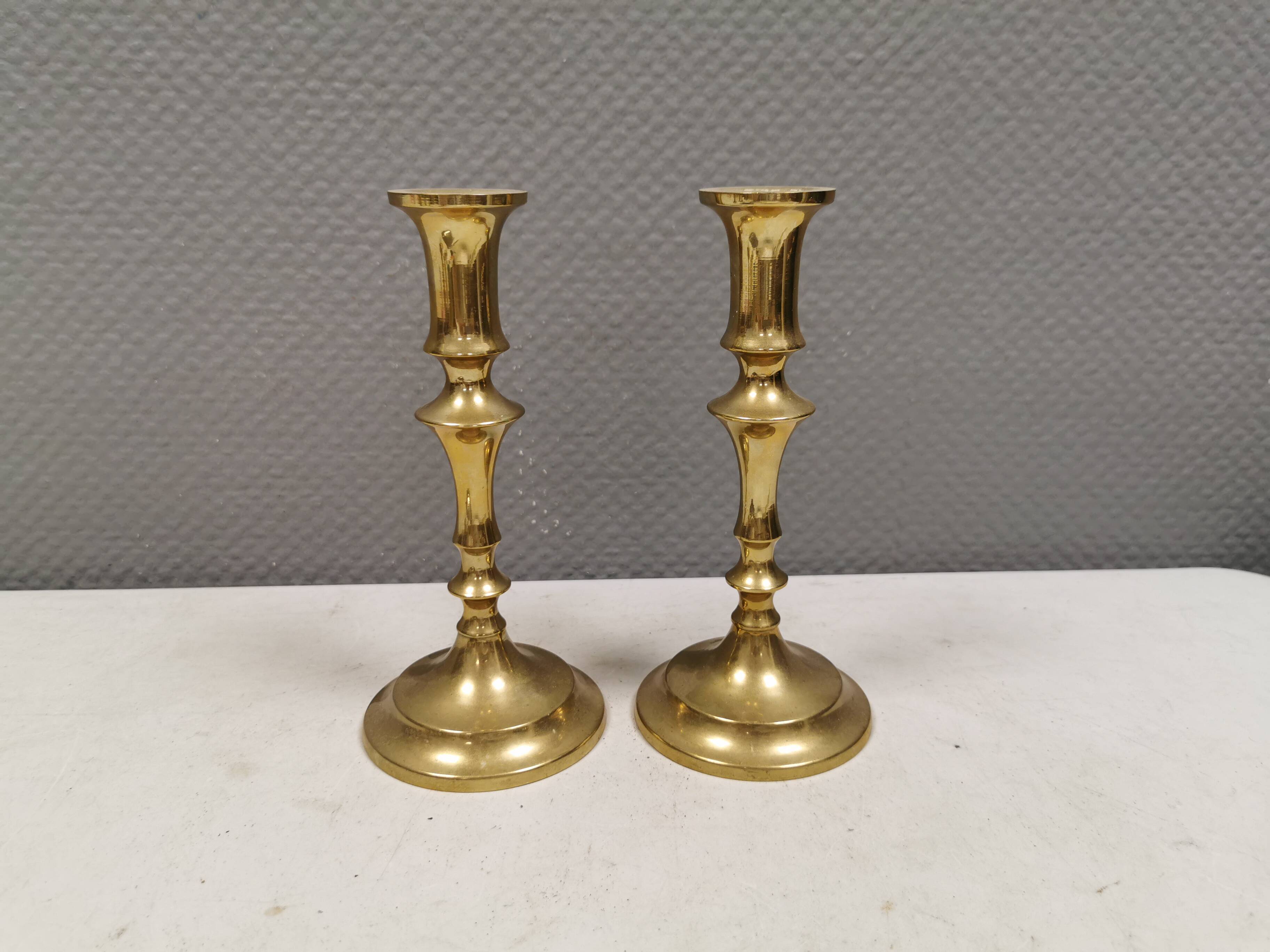 A set of vintage brass candlesticks. Denmark 1960-70s.