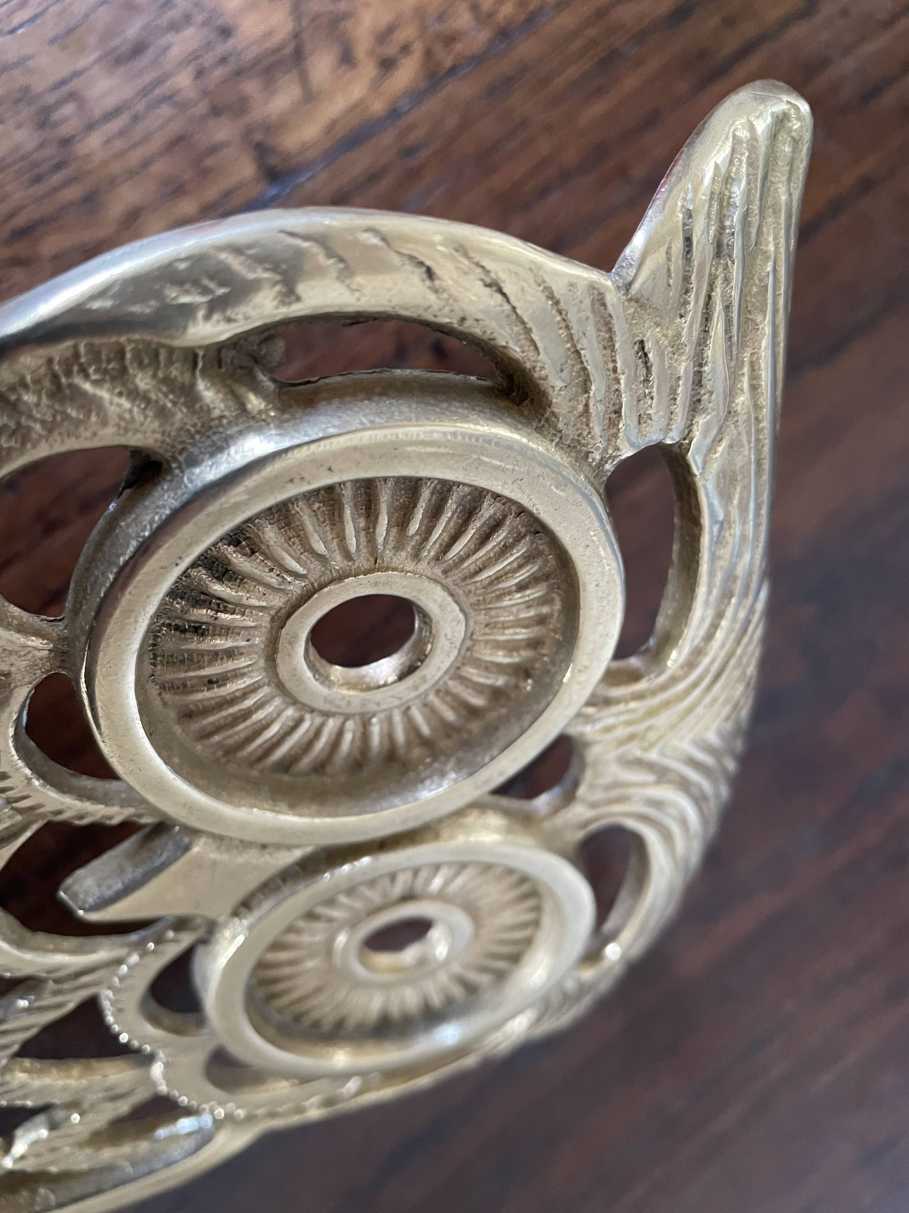 Owl trivet in golden brass