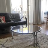 Round coffee table in smoked glass with chrome legs
