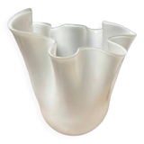 White glass vase in corolla shape