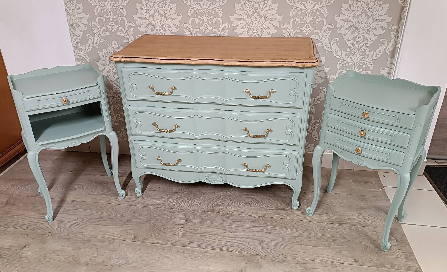 Louis XV style chest of drawers and bedside tables.