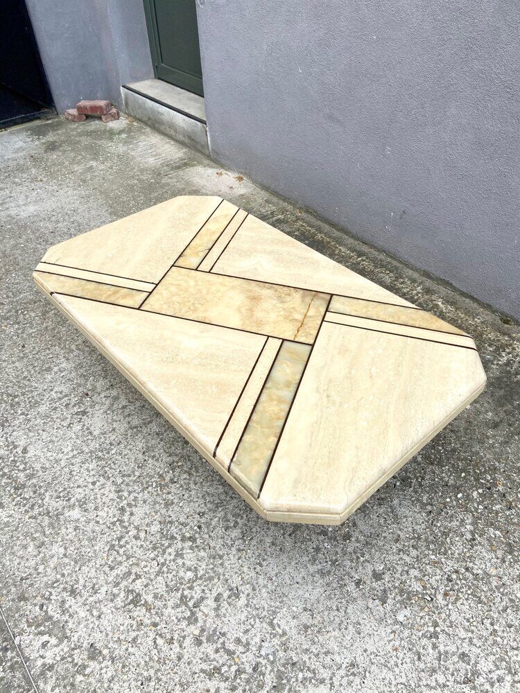 Low table in travertine and onyx 80'