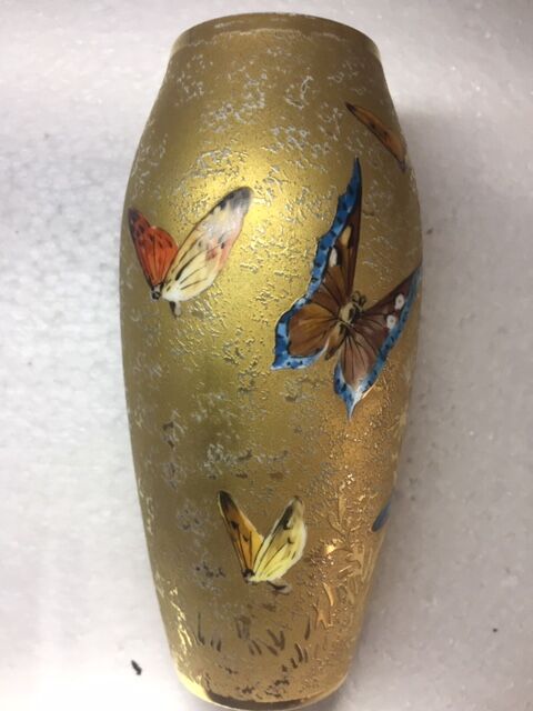 Soliflower with golden butterflies