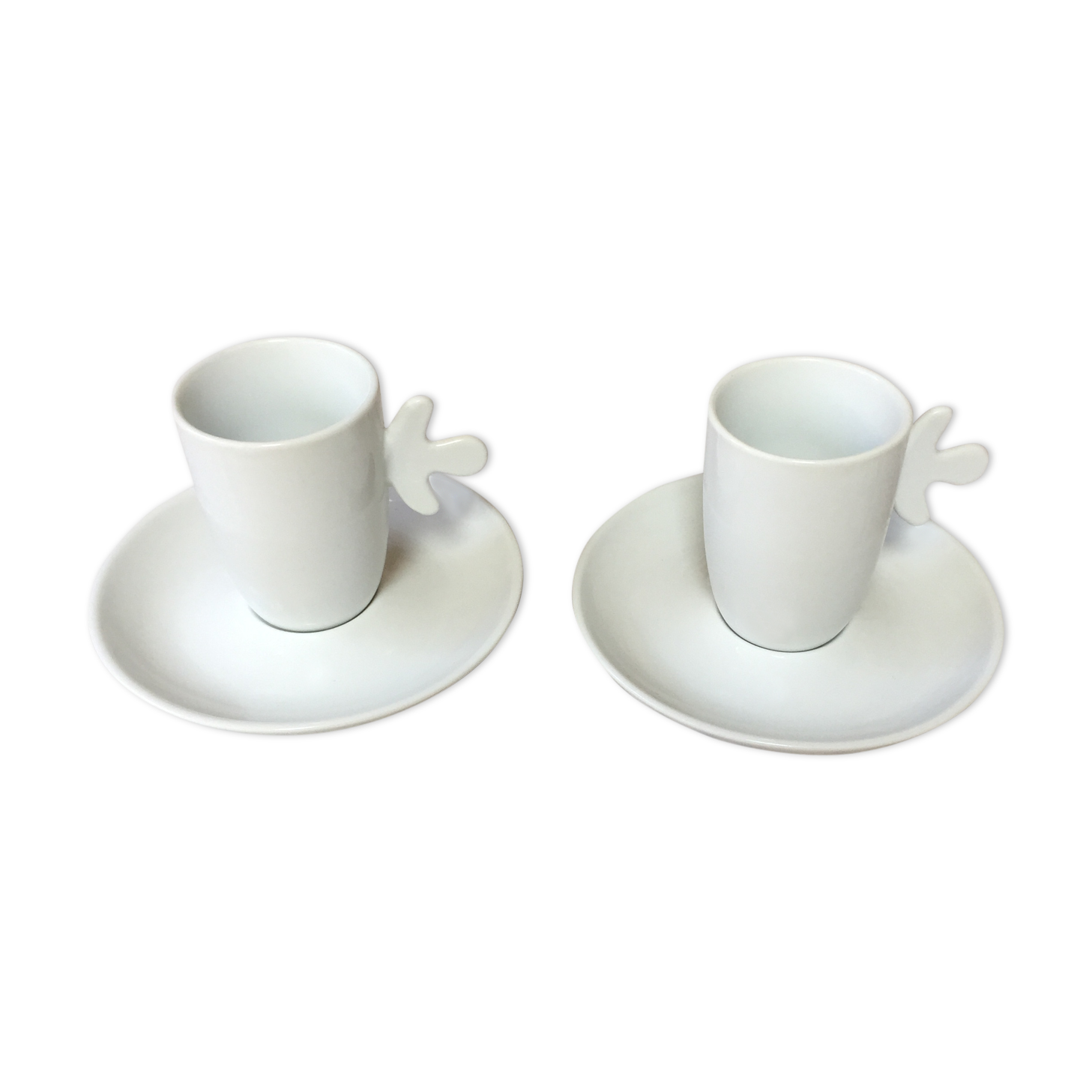 Duo of cups and under cups with white porcelain coffee S-P