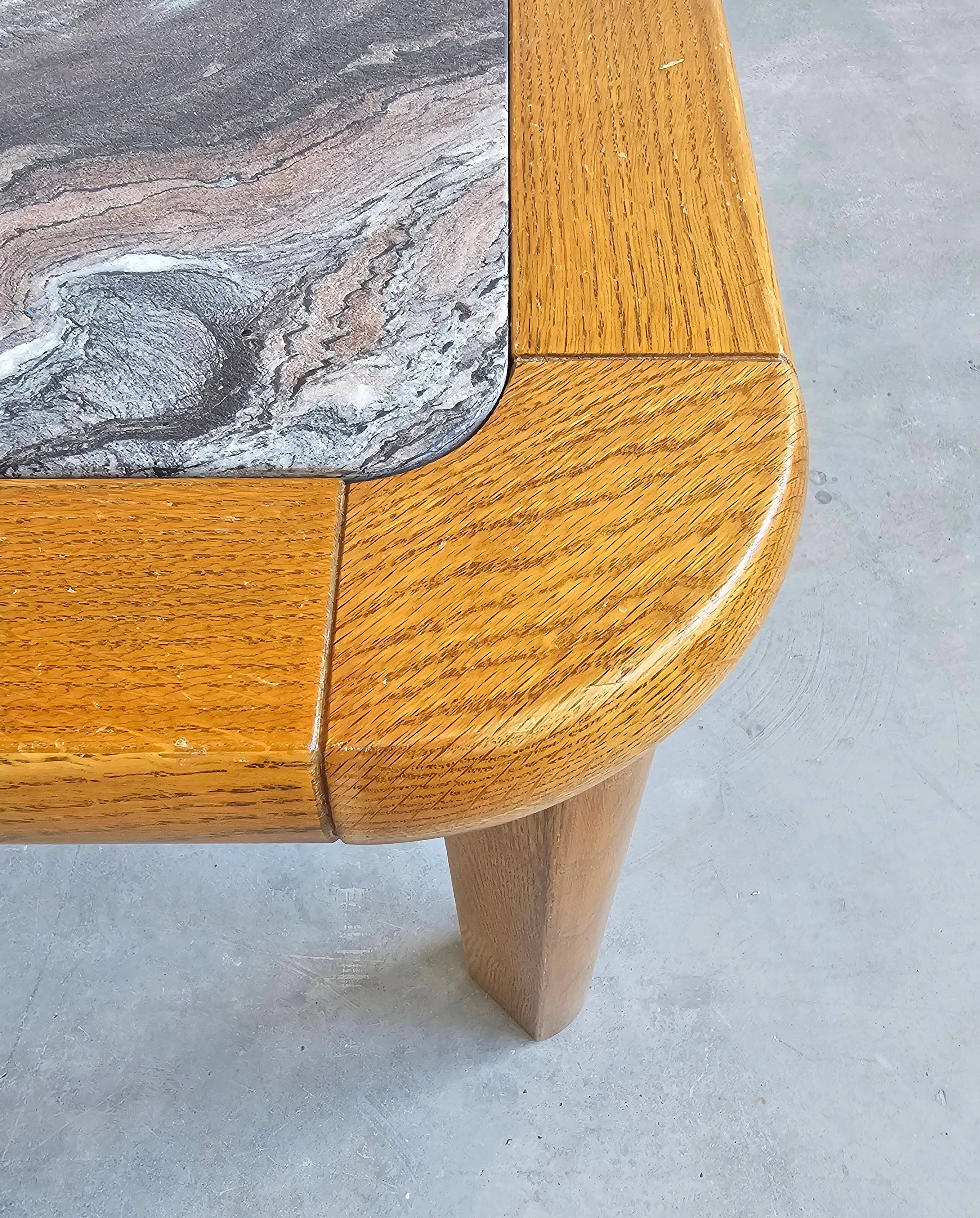 Brutalist coffee table in solid oak with a Rosso Luana marble top.