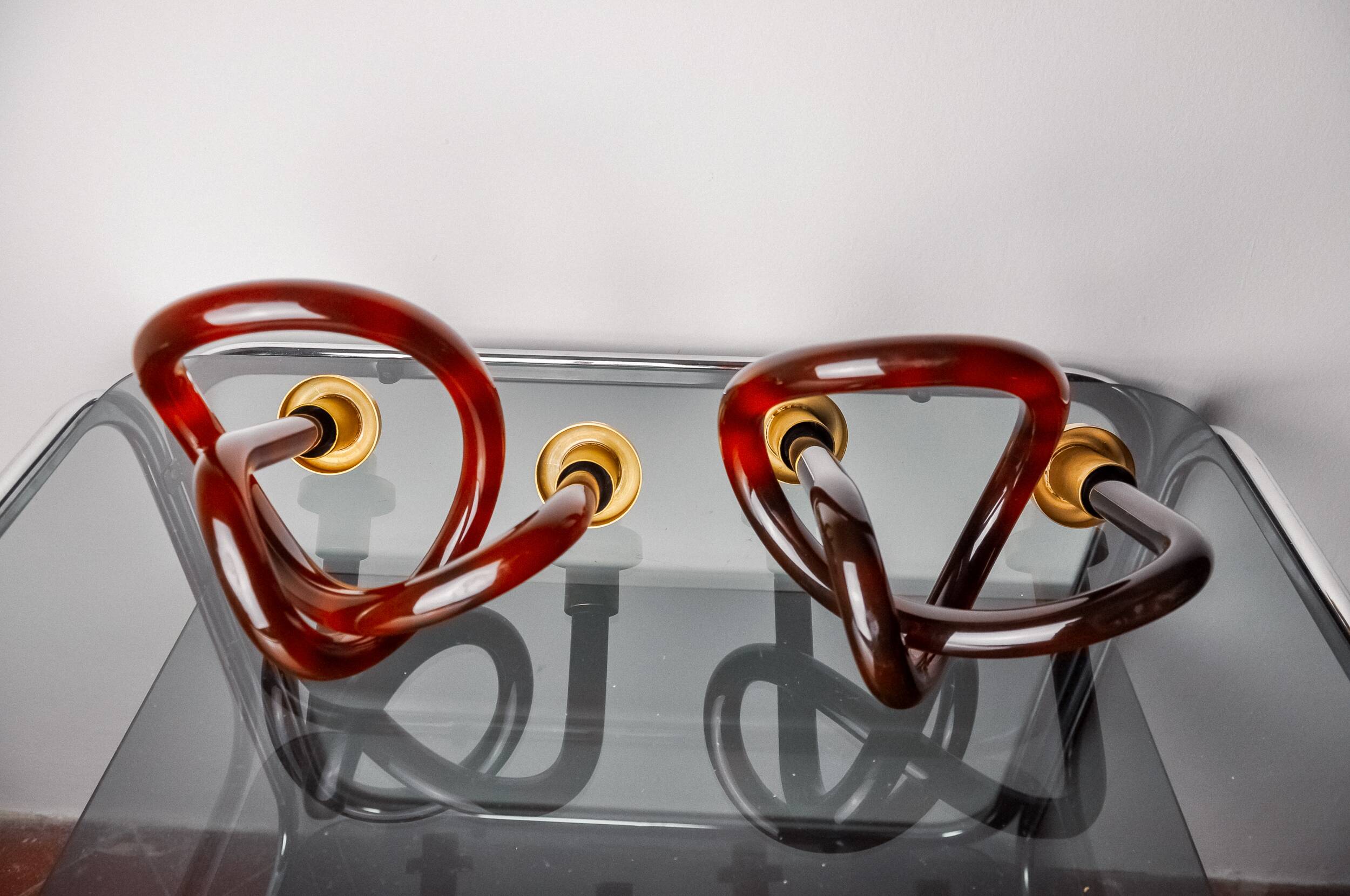 Pair of pretzel candlesticks by Dorothy Thorpe in lucite, 1970